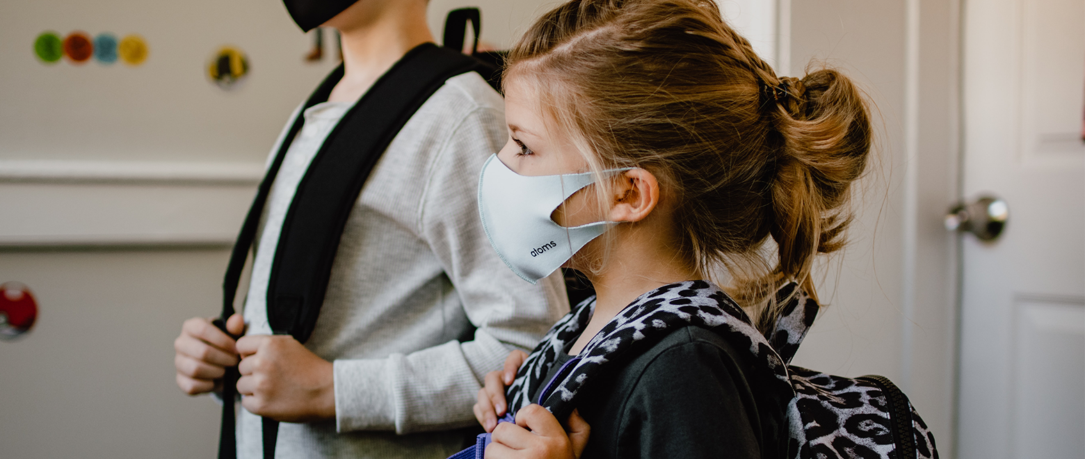 Educação-Infantil-recebendo-as-crianças-depois-da-pandemia-criança-com-máscara